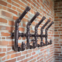 Load image into Gallery viewer, Industrial Iron Coat Rack
Make your home an industrial haven with this unique handmade Industrial Iron Coat Rack. Boasting utility and a sturdy industrial iron construction, take on the challenge of revamping your storage and organisation in bold fashion.