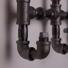 Load image into Gallery viewer, Industrial Iron Coat Rack
Make your home an industrial haven with this unique handmade Industrial Iron Coat Rack. Boasting utility and a sturdy industrial iron construction, take on the challenge of revamping your storage and organisation in bold fashion.