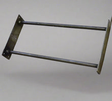 Load image into Gallery viewer, Metal bracket on a tiled floor with a ruler for scale
