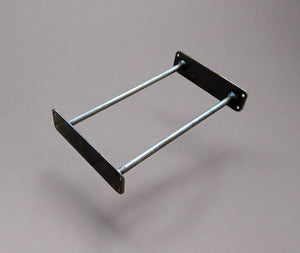Metal bracket on a wooden floor