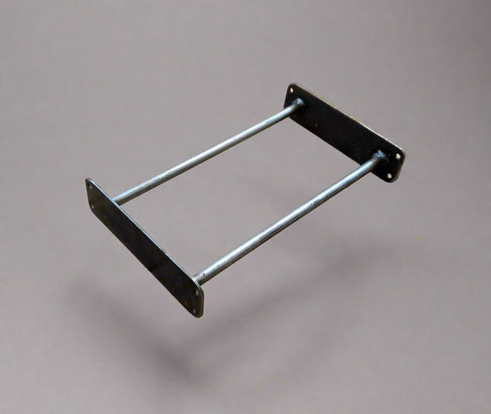 Metal bracket on a wooden floor