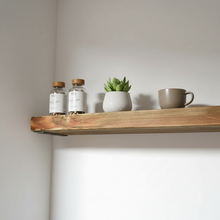 Load image into Gallery viewer, Wooden alcove shelf with bottles, plant and mug
