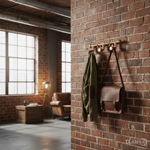 Load image into Gallery viewer, Hanging rack with a bag and jacket against a brick wall in an industrial-style room.