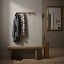 Load image into Gallery viewer, Entryway with coat rack, bench, shoes, and umbrella stand against a wall.