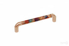 Load image into Gallery viewer, Close-up of copper pull handle showing rainbow iridescent finish and polished ends